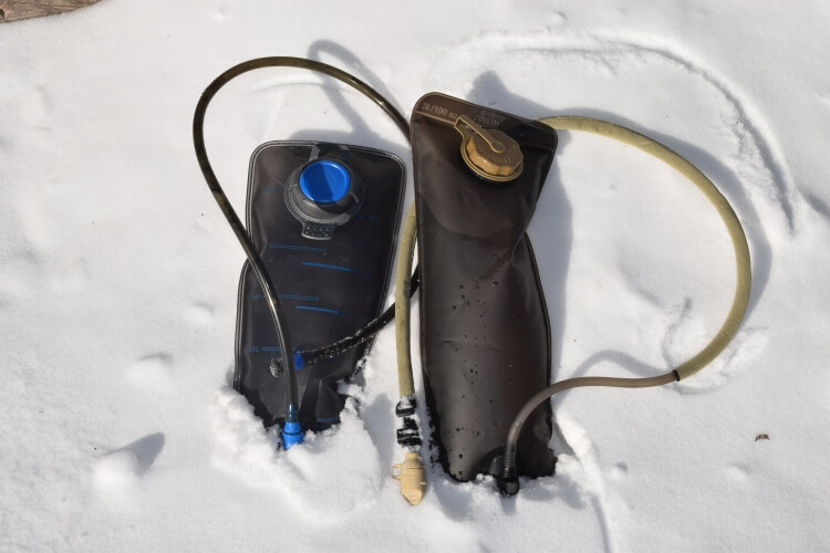 Preventing hydration packs from freezing in cold weather