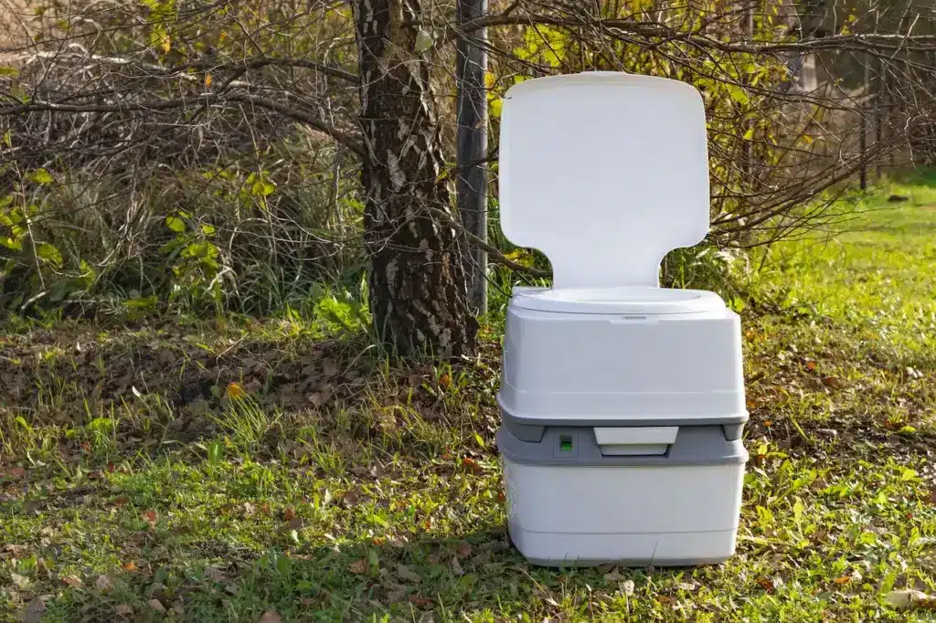A Portable Plastic Toilet in the Ground