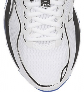 Close-up view of a white and black running shoe focused on the top and front, suitable for hiking, showing laces, mesh fabric, and design details.