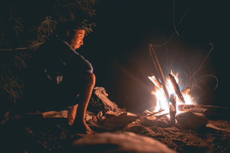 Camping solo by the fire