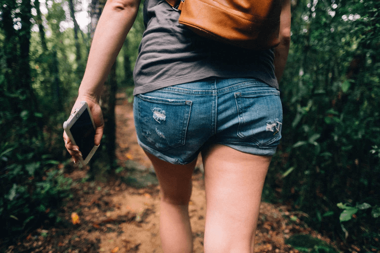 Girl hiking in jean shorts