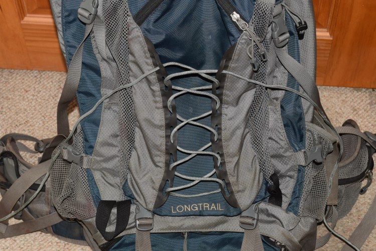 Criss cross lashing design on backpack