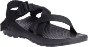 A black sports sandal with adjustable straps and a contoured footbed, ideal for hiking, featuring a textured insole and a small circular logo on the side.