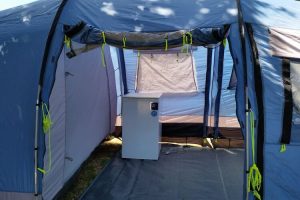 Mini fridge inside camping tent