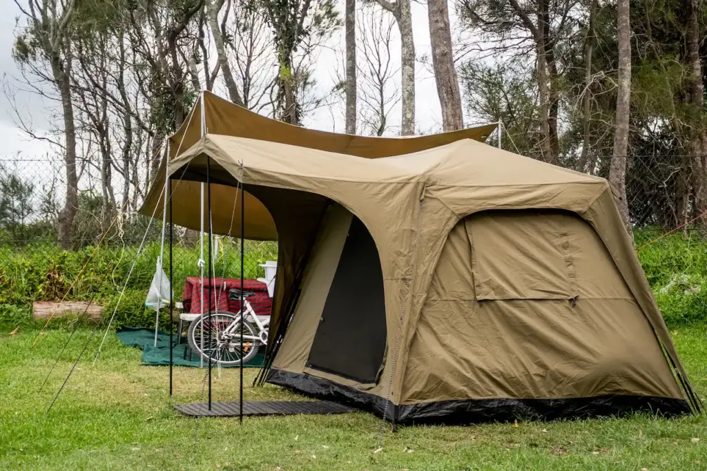 A Brown Family Tent Setup at the Campsite 