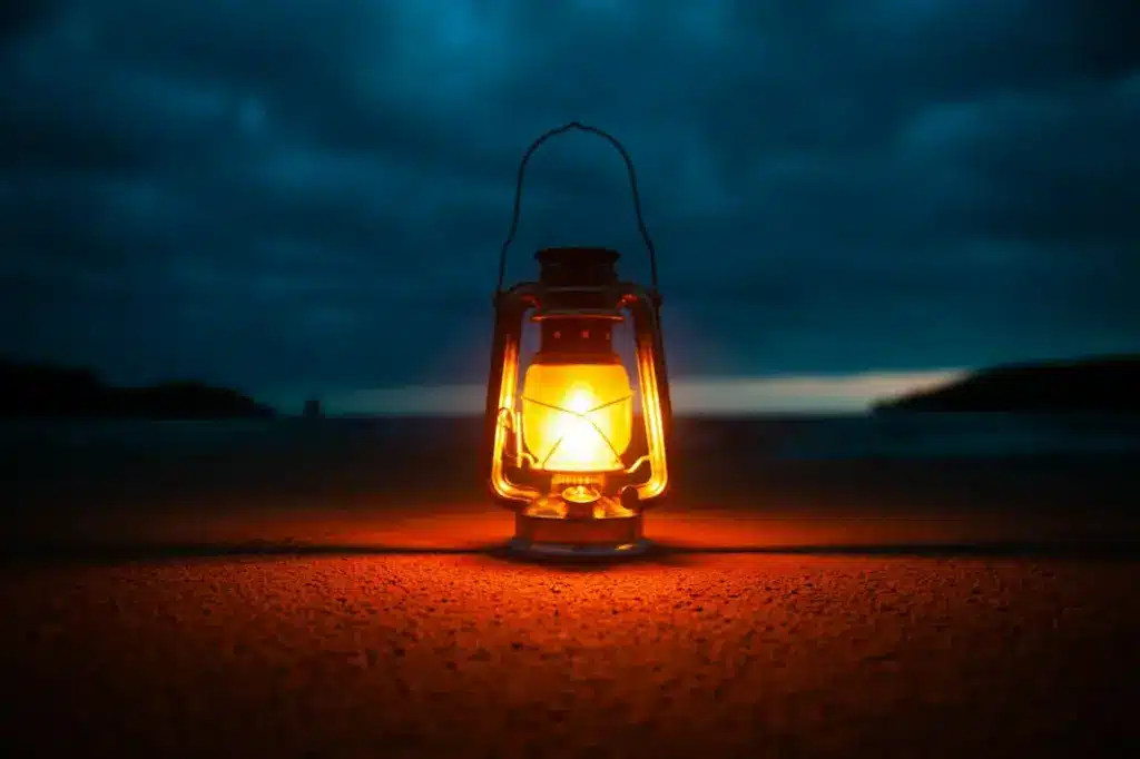 Using A Oil Lantern At Night In The Desert