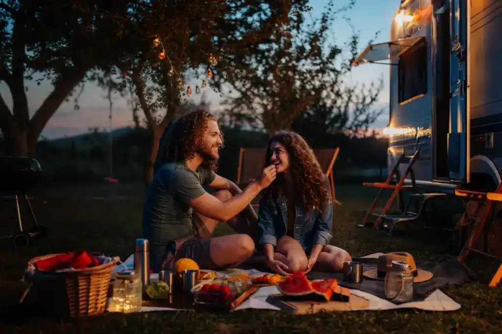 Couple Eating in the Camping Trip