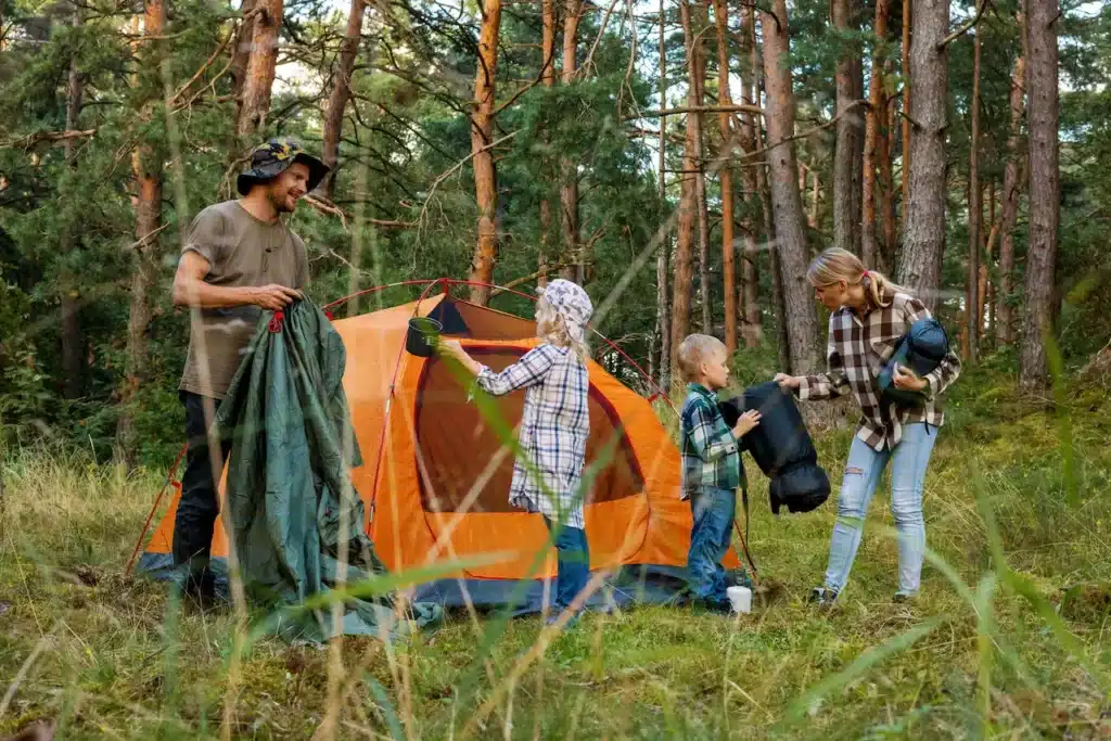 Family setting up their tent 