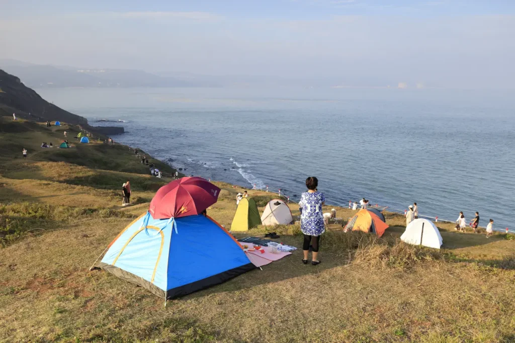 People are Camping Next to the Sea